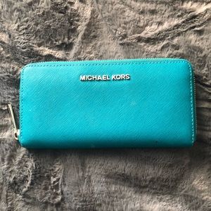 Michael Kors turquoise zip around wallet